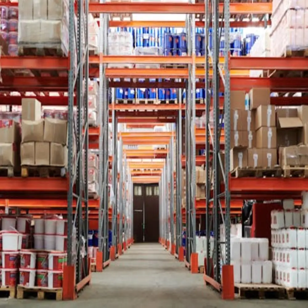 A view of an organized warehouse with shelves stacked with boxes and containers